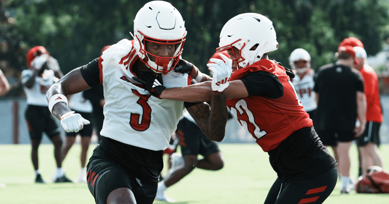 U of L WR Dacari Collins (3) fights to get open on a route on the practice field at Cardinal Stadium in Louisville, Ky. on July 30, 2025.