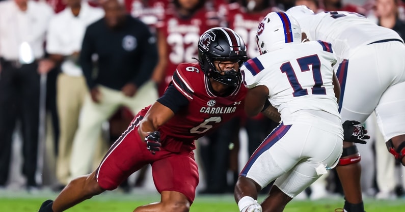 Sep 6, 2025; Columbia, South Carolina, USA; South Carolina Gamecocks linebacker Dylan Stewart (6) brings down South Carolina State Bulldogs running back KZ Adams (17) in the first quarter at Williams-Brice Stadium. Mandatory Credit: Jeff Blake-Imagn Images