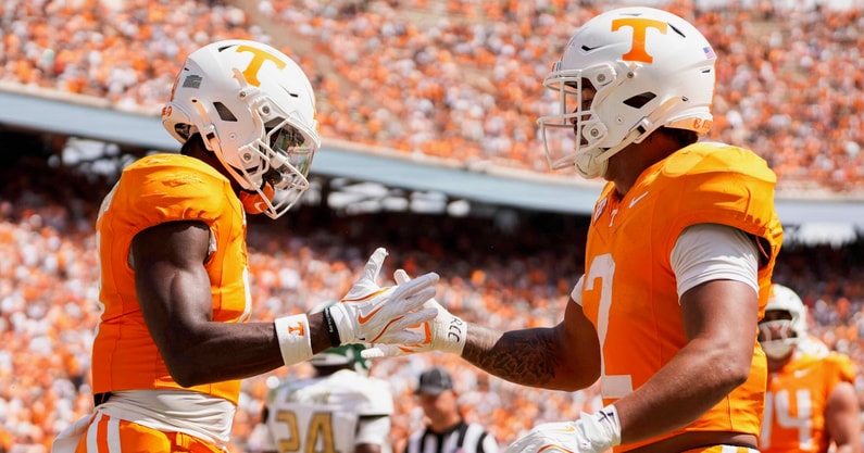 Angelina Alcantar/News Sentinel / USA TODAY NETWORK via Imagn Images | Tennessee wide receiver Mike Matthews (4) celebrates with Tennessee running back Peyton Lewis (2) after Lewis scores a touchdown during a NCAA football game between Tennessee and UAB at Neyland Stadium in Knoxville, Tenn., September 20, 2025.