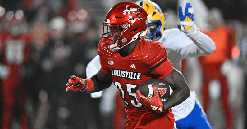 Nov 23, 2024; Louisville, Kentucky, USA; Louisville Cardinals running back Isaac Brown (25) runs against the Pittsburgh Panthers during the second half at L&N Federal Credit Union Stadium. Louisville defeated Pittsburgh 37-9. Mandatory Credit: Jamie Rhodes-Imagn Images
