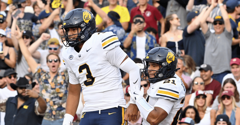 Cal quarterback Jaron-Keawe Sagapolutele and receiver Jacob De Jesus