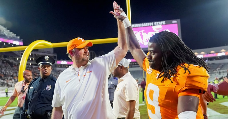 Brianna Paciorka/News Sentinel / USA TODAY NETWORK via Imagn Images | Tennessee coach Josh Heupel high fives Tennessee running back Star Thomas (9) after the Vols defeated Mississippi State in overtime at Davis Wade Stadium in Starkville, Miss., on Sept. 27, 2025.