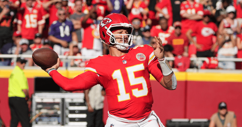Sep 28, 2025; Kansas City, Missouri, USA; Kansas City Chiefs quarterback Patrick Mahomes (15) throws a pass during the first quarter against the Baltimore Ravens at GEHA Field at Arrowhead Stadium. Mandatory Credit: Denny Medley-Imagn Images