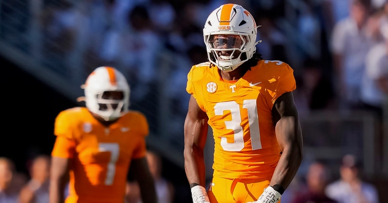 Brianna Paciorka/News Sentinel / USA TODAY NETWORK via Imagn Images | Tennessee defensive lineman Caleb Herring (31) flexes after making a play during a college football game between Tennessee and Mississippi State at Davis Wade Stadium in Starkville, Miss., on Sept. 27, 2025.