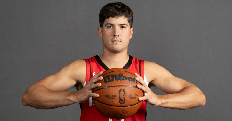 Sep 29, 2025; Houston, TX, USA; Houston Rockets guard Reed Sheppard (15) poses for a picture during Houston Rockets media day at Toyota Center. Mandatory Credit: Troy Taormina-Imagn Images