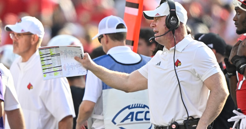 Oct 4, 2025; Louisville, Kentucky, USA; Louisville Cardinals head coach Jeff Brohm calls out instructions during the second quarter against the Virginia Cavaliers at L&N Federal Credit Union Stadium. Virginia defeated Louisville 30-27. Mandatory Credit: Jamie Rhodes-Imagn Images