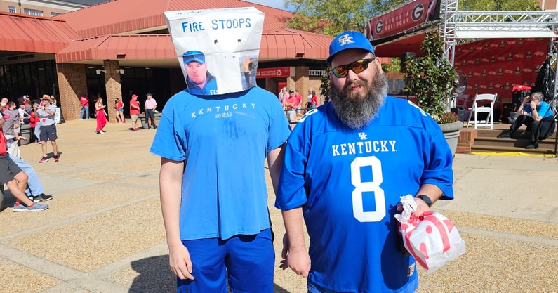 Kentucky fan wears bag on his head at Georgia (Photo via Andrew Board on X)