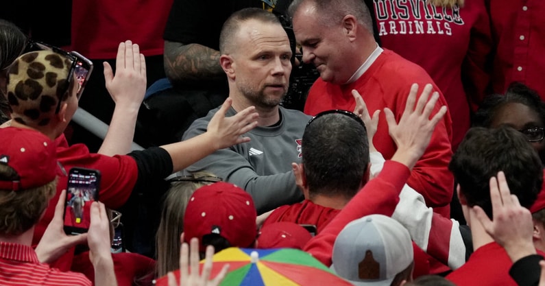 Louisville's head coach Pat Kelsey goes through the crowd after the win over Stanford Saturday at KFC Yum! Center. March 8, 2025