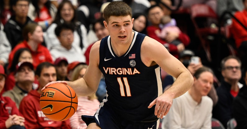 Jan 11, 2025; Stanford, California, USA; Virginia Cavaliers guard Isaac McKneely (11) dribbles against the Stanford Cardinal in the first half at Maples Pavilion. Mandatory Credit: Eakin Howard-Imagn Images