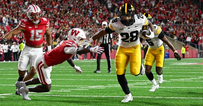 The best shots of the action between the Hawkeyes and Badgers. (Photo by Dennis Scheidt)
