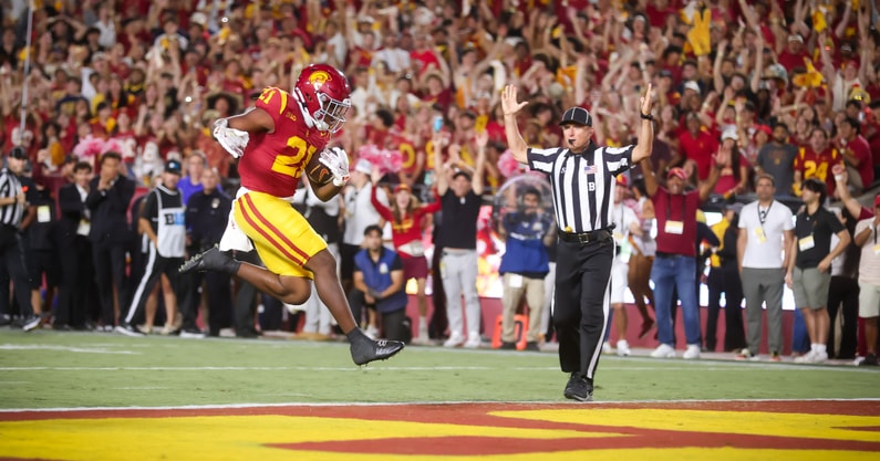 USC running back Bryan Jackson runs for a touchdown against Michigan
