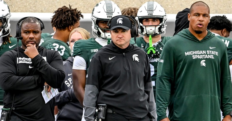 Michigan State's head coach Jonathan Smith, center, looks on from the sideline during the third quarter in the game against UCLA on Saturday, Oct. 11, 2025, at Spartan Stadium in East Lansing. - USA TODAY Sports