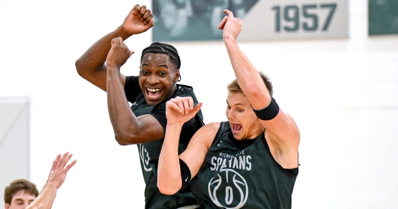 Michigan State's Cam Ward, left, and Jaxon Kohler celebrate during the first day of basketball practice on Monday, Sept. 22, 2025, at the Breslin Center in East Lansing. - Nick King, USA TODAY Sports