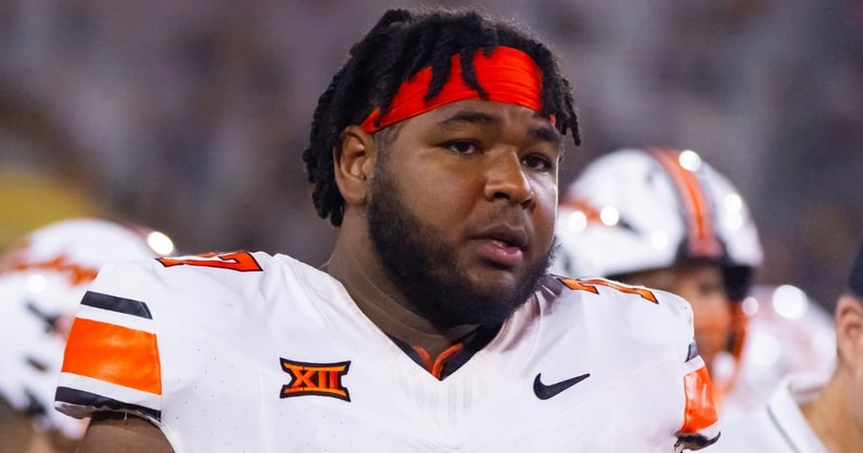 Sep 9, 2023; Tempe, Arizona, USA; Oklahoma State Cowboys offensive lineman Noah McKinney (77) against the Arizona State Sun Devils at Mountain America Stadium. Mandatory Credit: Mark J. Rebilas-Imagn Images