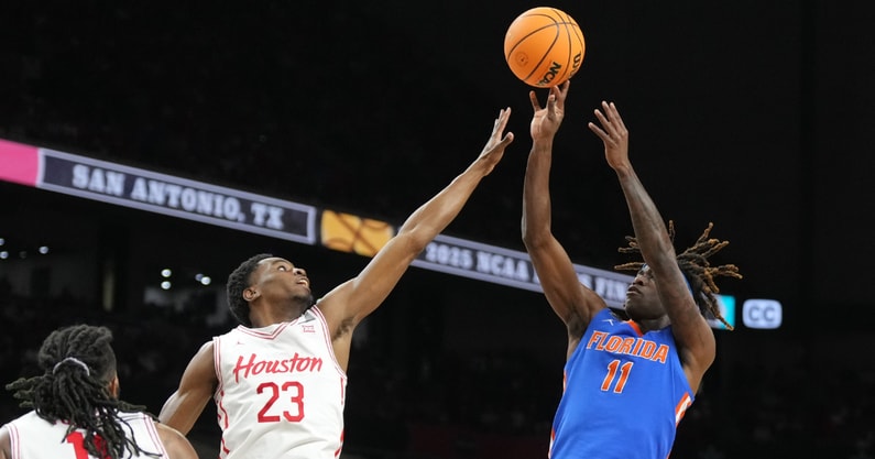 Apr 7, 2025; San Antonio, TX, USA; Florida Gators guard Denzel Aberdeen (11) shoots over Houston Cougars guard Terrance Arceneaux (23) in the first half in the national championship game of the Final Four of the 2025 NCAA Tournament at the Alamodome. Mandatory Credit: Robert Deutsch-Imagn Images