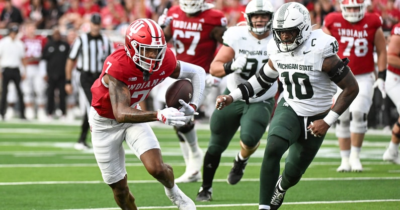 Indiana Hoosiers wide receiver E.J. Williams Jr. (7) runs after a catch past Michigan State Spartans linebacker Wayne Matthews (10) during the first half at Memorial Stadium. - Robert Goddin, USA TODAY Sports