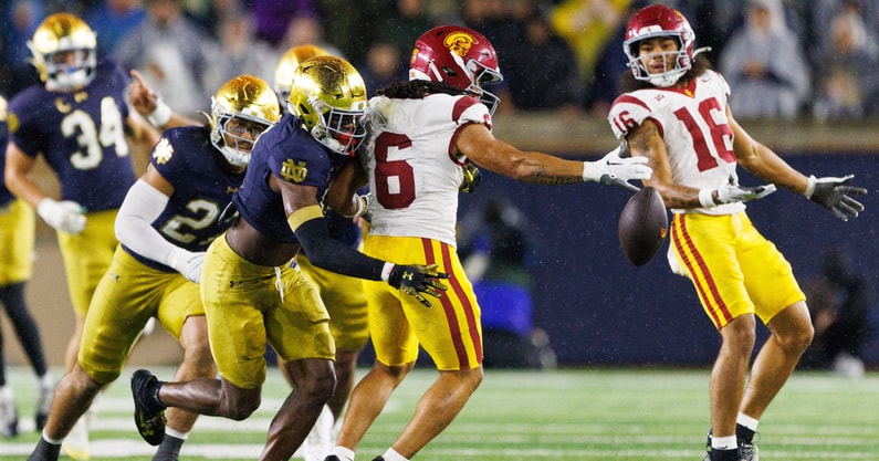 Notre Dame safety Adon Shuler, left, knocks the ball out of the hand of Southern California wide receiver Makai Lemon (6) in the second half of a NCAA football game at Notre Dame Stadium on Saturday, Oct. 18, 2025, in South Bend