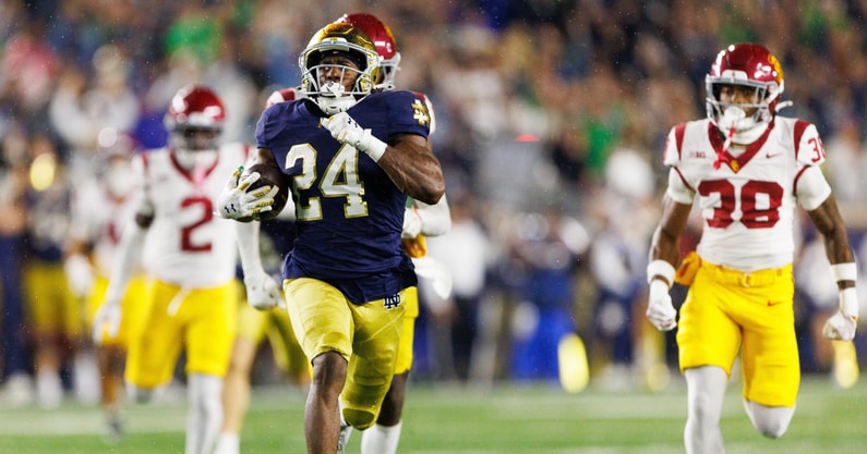 Notre Dame running back Jadarian Price (24) returns a kick for a touchdown in the second half of a NCAA football game against USC at Notre Dame Stadium on Saturday, Oct. 18, 2025, in South Bend