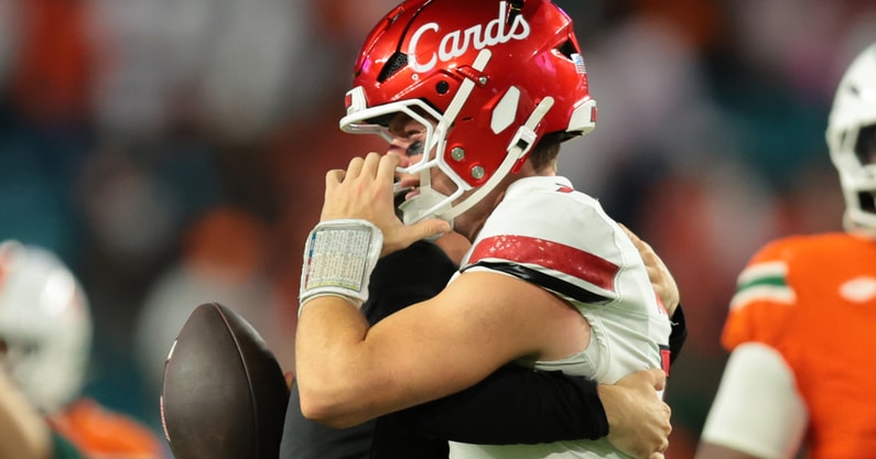 Oct 17, 2025; Miami Gardens, Florida, USA; Louisville Cardinals quarterback Miller Moss (7) celebrates after winning the game against the Miami Hurricanes at Hard Rock Stadium. Mandatory Credit: Sam Navarro-Imagn Images