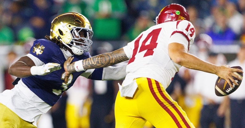 Notre Dame linebacker Jaylen Sneed (3) rushes USC quarterback Jayden Maiava (14) in the first half of a NCAA football game at Notre Dame Stadium on Saturday, Oct. 18, 2025, in South Bend