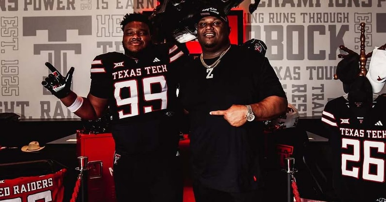 Ayden Johnson with Texas Tech DL coach Zarnell Fitch