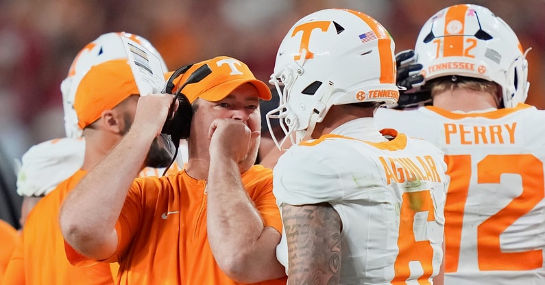 Brianna Paciorka/News Sentinel / USA TODAY NETWORK via Imagn Images | Tennessee coach Josh Heupel talks with Tennessee quarterback Joey Aguilar (6) during a college football game between Tennessee and Alabama at Bryant-Denny Stadium in Tuscaloosa, Ala., on Oct. 18, 2025.