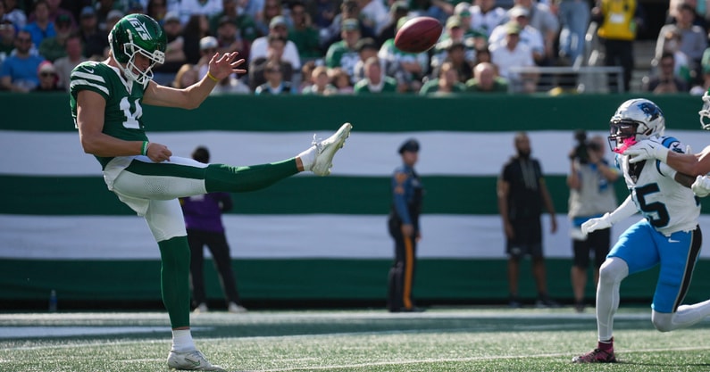 New York Jets punter Austin McNamara (14) kicks the ball during a game against the Carolina Panthers at MetLife Stadium, Oct 19, 2025, East Rutherford, NJ, USA