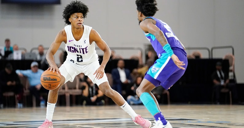 Dec 22, 2022; Las Vegas, NV, USA; NBA G League Ignite guard London Johnson (2) dribbles the ball against Greensboro Swarm guard Kobi Simmons (2) during the first half at Mandalay Bay Convention Center. Mandatory Credit: Lucas Peltier-Imagn Images