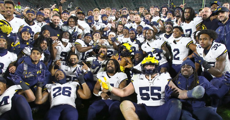 Michigan with Paul Bunyan Trophy in 2023