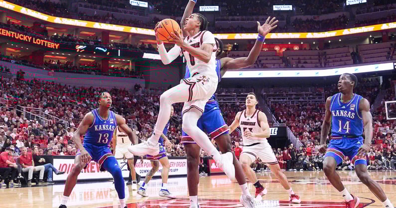 Louisville Cardinals guard Mikel Brown Jr. (0) goes for two of his 10 points in the Cards 90-82 loss against visiting Kansas in the exhibition game at the KFC Yum! Center in Louisville, Kentucky Friday, October 24, 2025.