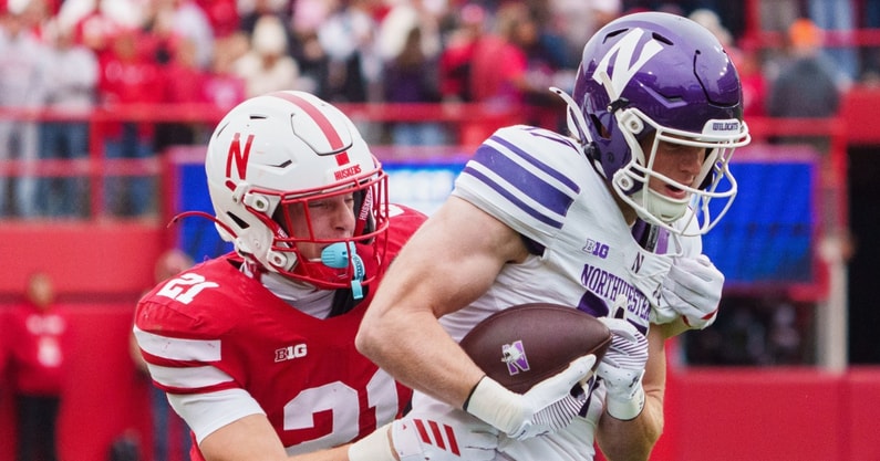 Nebraska football defensive back Rex Guthrie (21) tackles Northwestern wide receiver Griffin Wilde (17) tackles during the first quarter at Memorial Stadium.