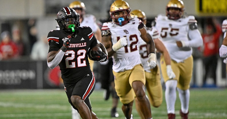 Oct 25, 2025; Louisville, Kentucky, USA; Louisville Cardinals running back Keyjuan Brown (22) runs the ball for a touchdown against the Boston College Eagles during the second half at L&N Federal Credit Union Stadium. Mandatory Credit: Jamie Rhodes-Imagn Images