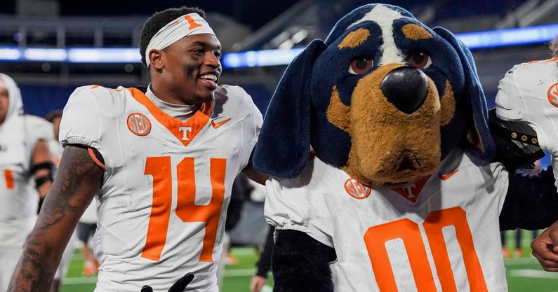 Tennessee wide receiver Braylon Staley (14) smiles as he stands next to Smokey after winning a NCAA football game against Kentucky at Kroger Field in Lexington, Kentucky on Oct. 25, 2025.