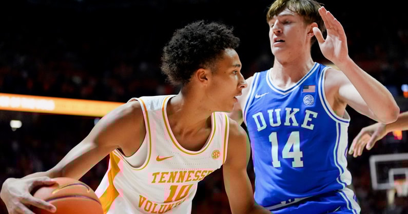 Tennessee forward Nate Ament (10) moves the ball while guarded by Duke guard/forward Nikolas Khamenia (14) during a college basketball exhibition game on October 26, 2025, in Knoxville, Tenn.