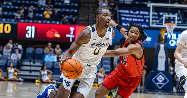 West Virginia forward Brenen Lorient drives to the basketball against Wheeling - Credit: WVSports.com