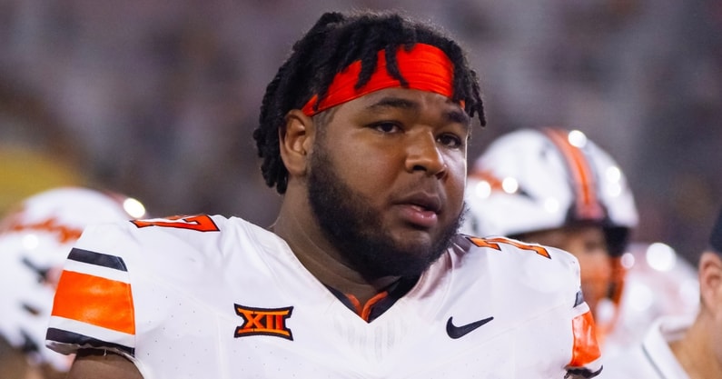 Sep 9, 2023; Tempe, Arizona, USA; Oklahoma State Cowboys offensive lineman Noah McKinney (77) against the Arizona State Sun Devils at Mountain America Stadium. Mandatory Credit: Mark J. Rebilas-Imagn Images