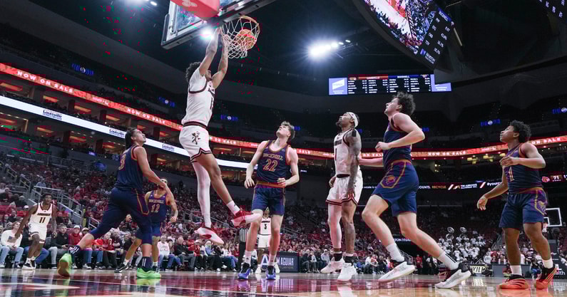 Louisville Cardinals forward Sananda Fru (13) slams down two points as the Cards roll on visiting Bucknell during an exhibition game at the KFC Yum! Center in Louisville, Kentucky Tuesday October 28, 2028.