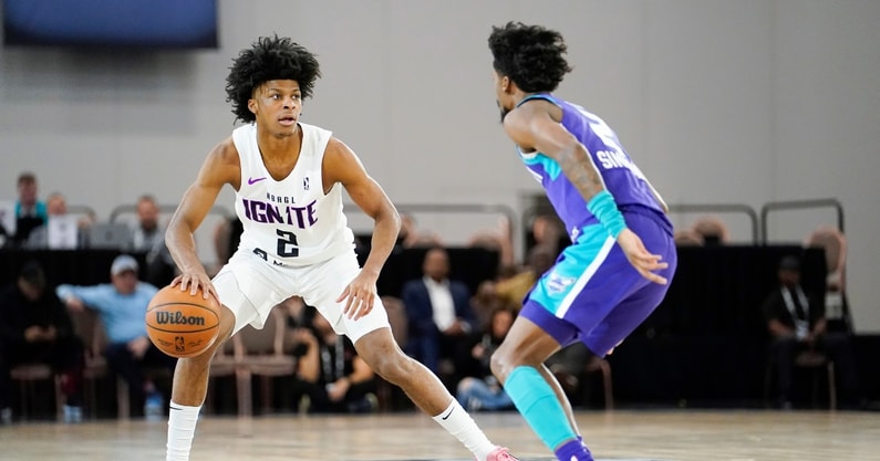 Dec 22, 2022; Las Vegas, NV, USA; NBA G League Ignite guard London Johnson (2) dribbles the ball against Greensboro Swarm guard Kobi Simmons (2) during the first half at Mandalay Bay Convention Center. Mandatory Credit: Lucas Peltier-Imagn Images