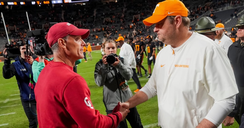 Brianna Paciorka/News Sentinel / USA TODAY NETWORK via Imagn Images | Oklahoma coach Brent Venables and Tennessee coach Josh Heupel shake hands after Oklahoma defeated Tennessee 33-27 in Neyland Stadium in Knoxville on Nov. 1, 2025.