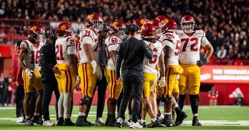 The USC Trojans huddle before taking the field against the Nebraska Cornhuskers