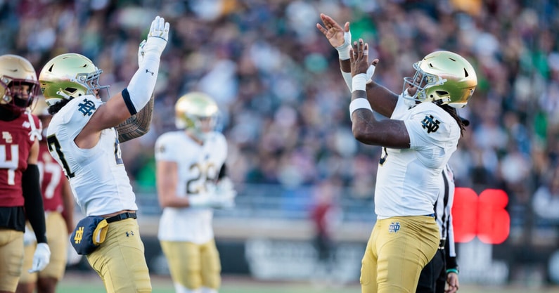 Notre Dame LB Kyngstonn Viliamu-Asa and DE Boubacar Traore Boston College