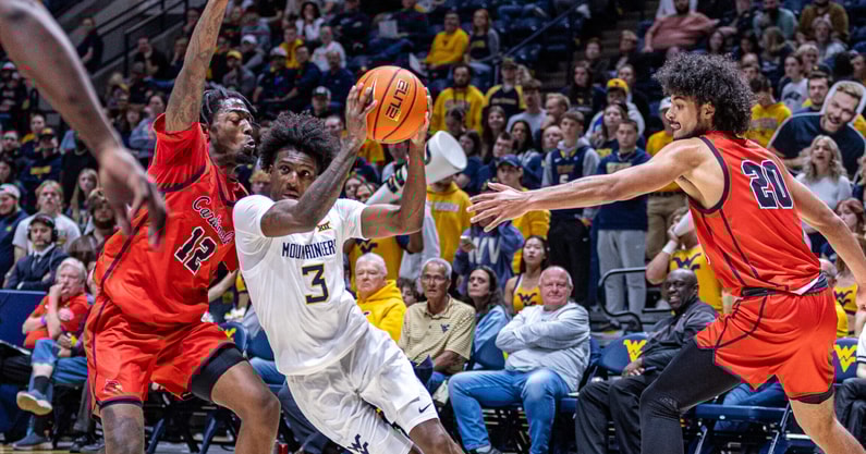 West Virginia guard Honor Huff drives against Wheeling