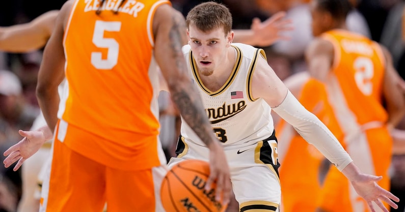 Grace Hollars/IndyStar / USA TODAY NETWORK | Purdue Boilermakers guard Braden Smith (3) watches the ball against Tennessee Volunteers guard Zakai Zeigler (5) on Sunday, March 31, 2024, during the midwest regional championship at the Little Caesars Arena in Detroit. The Purdue Boilermakers defeated the Tennessee Volunteers, 72-66.