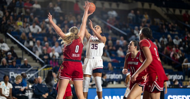 UConn Guard Azzi Fudd takes a shot against Louisville