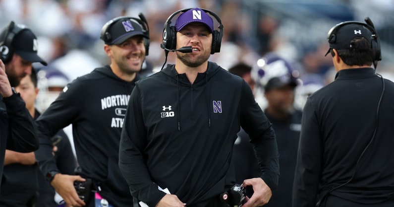 Northwestern Wildcats head coach David Braun walks on the sideline during the fourth quarter against the Penn State Nittany Lions at Beaver Stadium