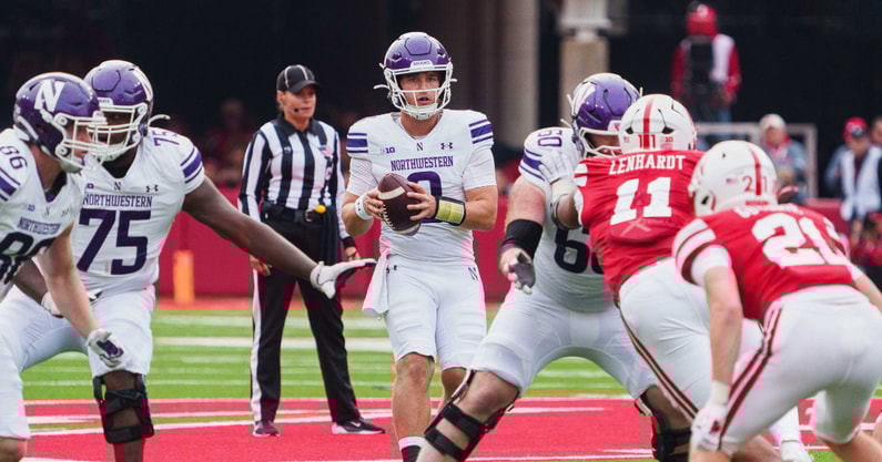 Northwestern Wildcats quarterback Preston Stone (8) looks to pass the ball against the Nebraska Cornhuskers during the fourth quarter at Memorial Stadium