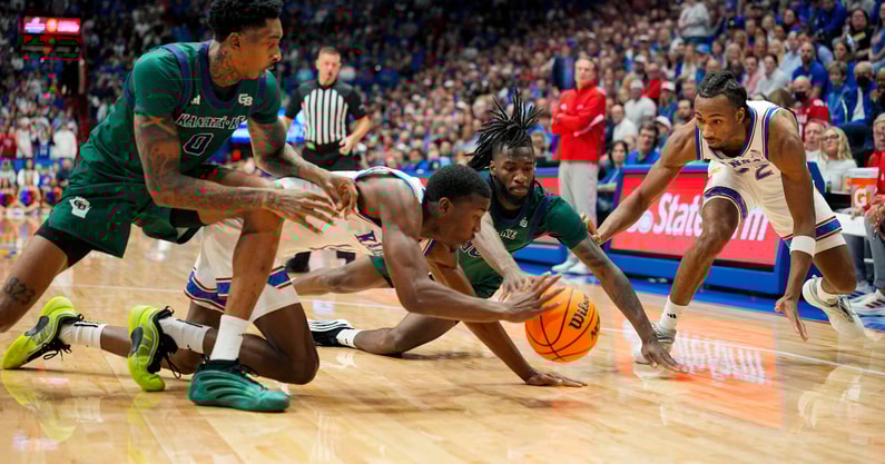 KU guards Darryn Peterson and Melvin Council