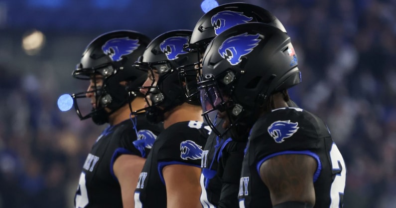 Kentucky players line up during a night game at Kroger Field on 10:25:2025 - Dr. Michael Huang, Kentucky Sports Radio:On3