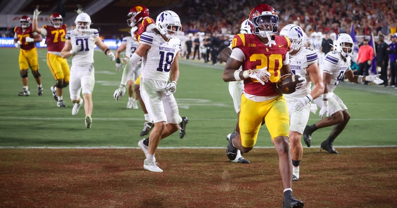 USC Trojans running back King Miller scores a touchdown against Northwestern