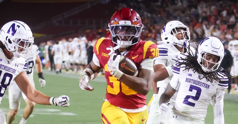 USC running back King Miller scores a touchdown against Northwestern